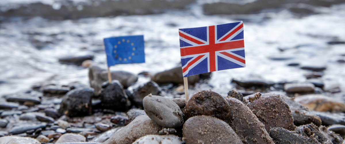 EU and UK flags on rocks